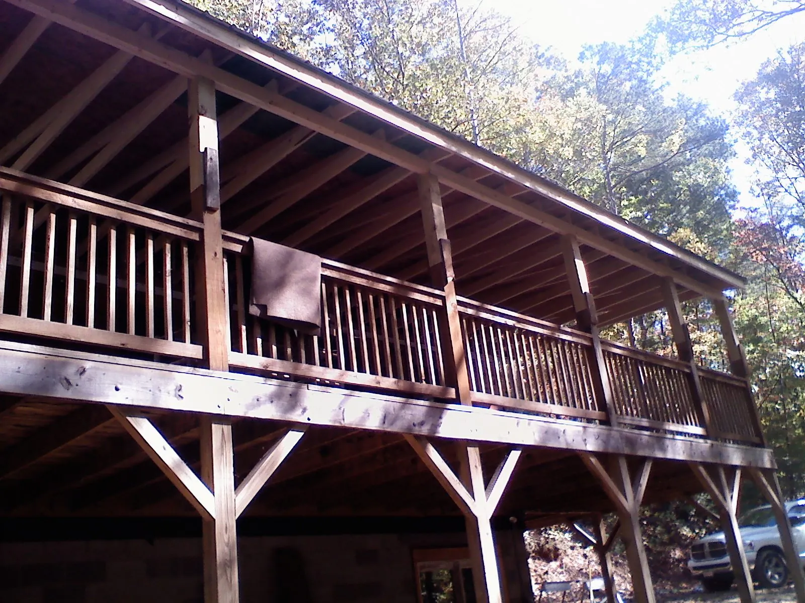 Timber framing under a new elevated porch and deck — Roof Leak Repair in Midfield by Roofing Brothers